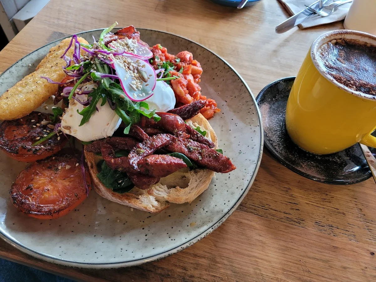A colourful breakfast and fresh coffee on a timber table at 1923 Blackwood Cafe
